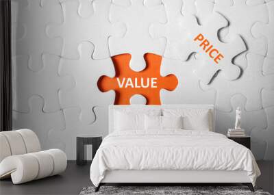 Puzzle with phrase PRICE VALUE on orange background, top view Wall mural