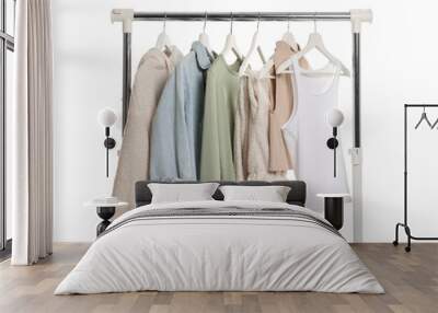 Rack with different clothes isolated on white Wall mural