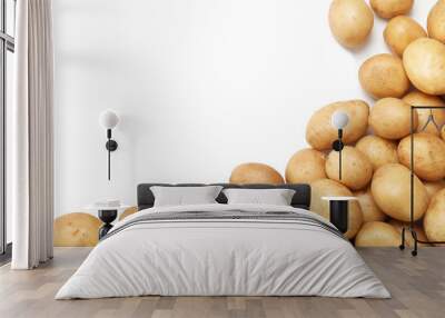 Raw fresh organic potatoes on white background, top view Wall mural