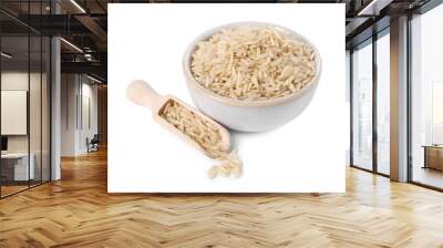 Raw rice in bowl and scoop isolated on white Wall mural