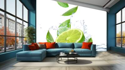 Ripe lime, fresh mint and splashing water on white background Wall mural