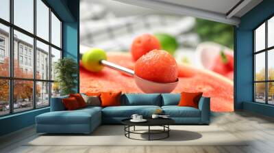 Scoop with delicious juicy watermelon on table, closeup Wall mural