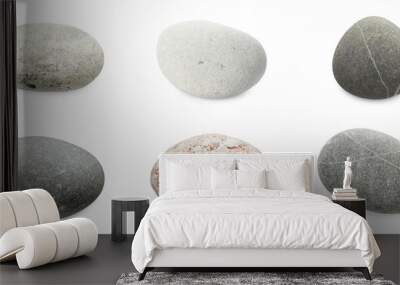 Sea pebbles. Different stones isolated on white, set Wall mural