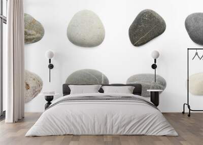 Sea pebbles. Different stones isolated on white, set Wall mural