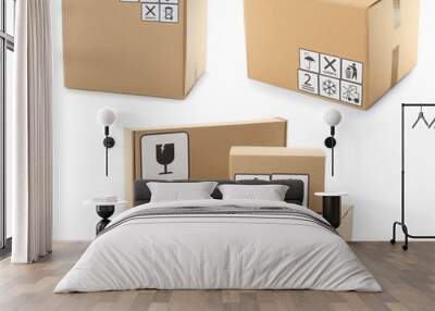 Set of cardboard boxes with packaging symbols on white background Wall mural