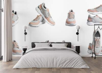 Set of comfortable modern sports shoes on white background Wall mural