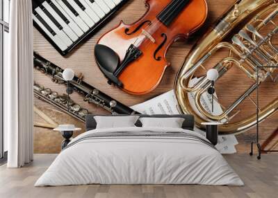 Set of different musical instruments on wooden background, flat lay Wall mural