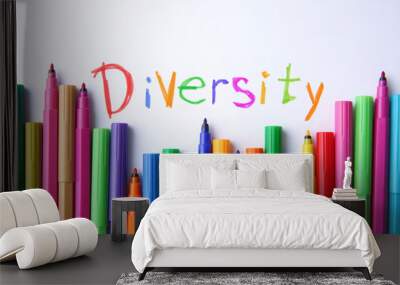 Set of felt tip pens and word Diversity written on white background, flat lay Wall mural