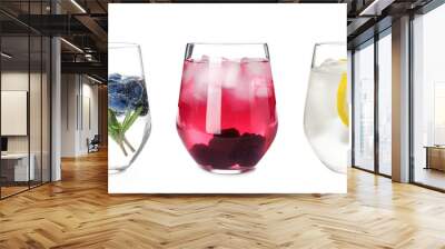 Set of glasses with different refreshing drinks on white background Wall mural