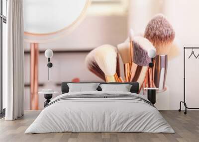 Set of professional makeup brushes in holder, closeup Wall mural