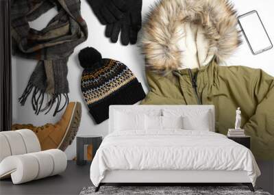 Set of stylish winter clothes on white background, top view Wall mural