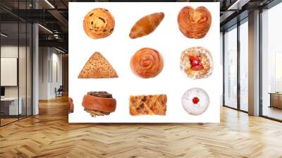 Set with different freshly baked pastries isolated on white, top view Wall mural