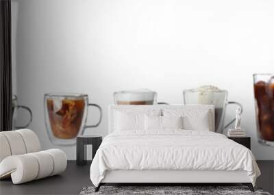 Set with different types of coffee drinks on white background Wall mural