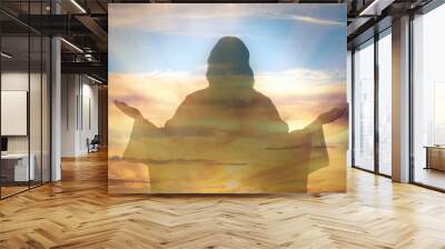 Silhouette of Jesus Christ and cloudy sky, double exposure Wall mural