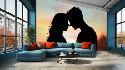 Silhouette of lovely couple enjoying each other at sunset Wall mural