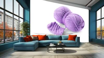 Skein of violet yarn, knitted fabric and needles isolated on white Wall mural