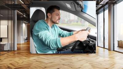 Sleepy tired man driving his modern car Wall mural