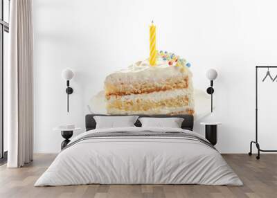 Slice of delicious birthday cake with candle on white background Wall mural