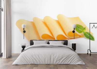 Slices of tasty cheese with basil on white background Wall mural