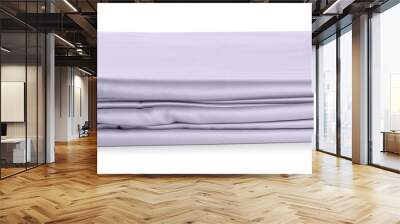 Stack of clean silky bed linen isolated on white Wall mural