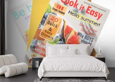 Stack of different magazines on white background, top view Wall mural