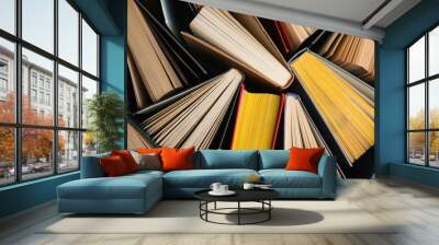 Stack of hardcover books as background, top view Wall mural