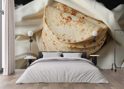 Stack of tasty homemade tortillas on table Wall mural