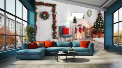 Stylish interior with beautiful Christmas tree and decorative fireplace Wall mural