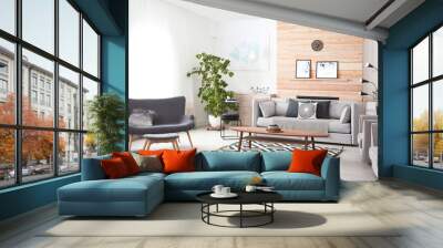 Stylish living room interior with comfortable couch and decorative elements Wall mural