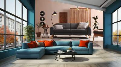 Stylish living room interior with comfortable dark sofa Wall mural