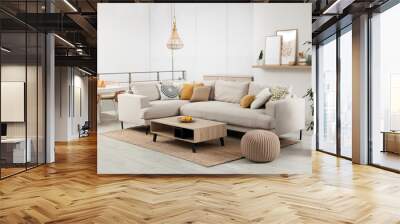 Stylish living room interior with comfortable grey sofa and coffee table Wall mural