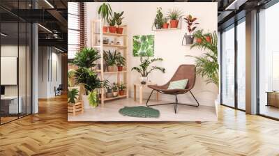 Stylish living room interior with home plants and lounge chair Wall mural