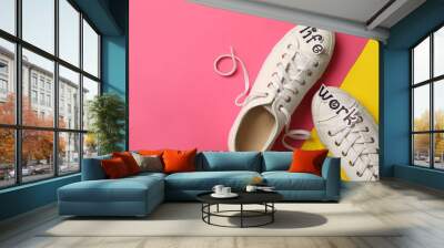 Stylish shoes on color background, flat lay with space for text. Life work balance concept Wall mural