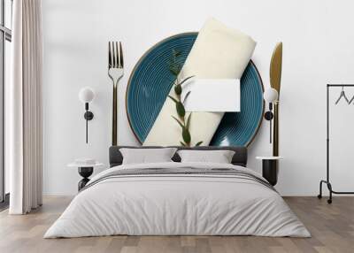 Stylish table setting with cutlery, blank card and eucalyptus leaves on white background, flat lay Wall mural