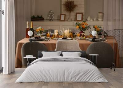 Table set with beautiful autumn decor for festive dinner in room Wall mural