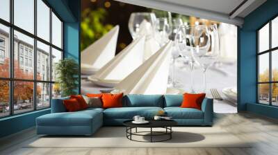 Table setting with empty glasses, plates and cutlery indoors Wall mural