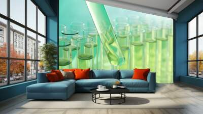 taking test tube with liquid sample, closeup Wall mural