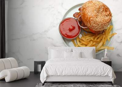 Tasty burger, French fries and sauce on white marble table, top view with space for text. Fast food Wall mural