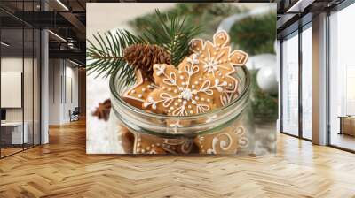 Tasty Christmas cookies in glass jar and festive decor on table, closeup Wall mural