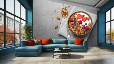 Tasty homemade granola  served on grey table, flat lay with space for text. Healthy breakfast Wall mural