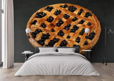 Tasty homemade pie with blueberries on grey textured table, closeup Wall mural