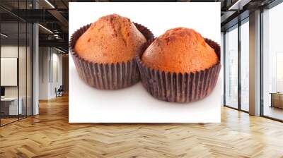 Tasty muffins in cupcake liners isolated on white Wall mural