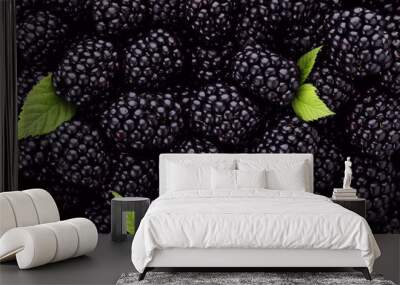 Tasty ripe fresh blackberries with leaves as background, closeup view Wall mural