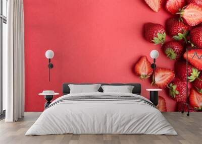 Tasty ripe strawberries on red background, flat lay. Space for text Wall mural