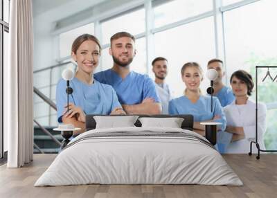 team of doctors in uniform at workplace Wall mural