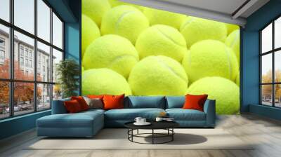 Tennis balls as background, closeup. Sports equipment Wall mural