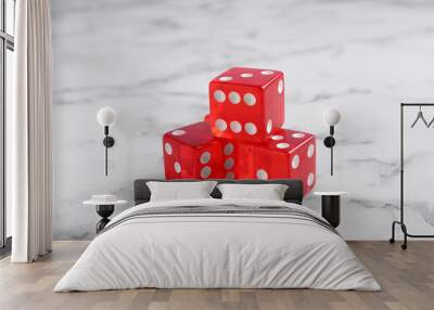 Three red game dices on white marble table, closeup Wall mural