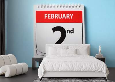 Top view of calendar with date February 2nd on light blue background. Groundhog day Wall mural