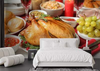 Traditional festive dinner with delicious roasted turkey served on table Wall mural