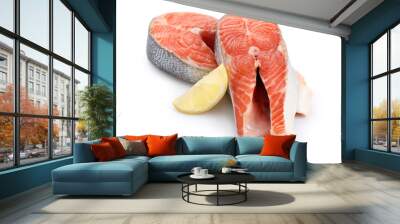 Two fresh salmon steaks and piece of lemon isolated on white Wall mural